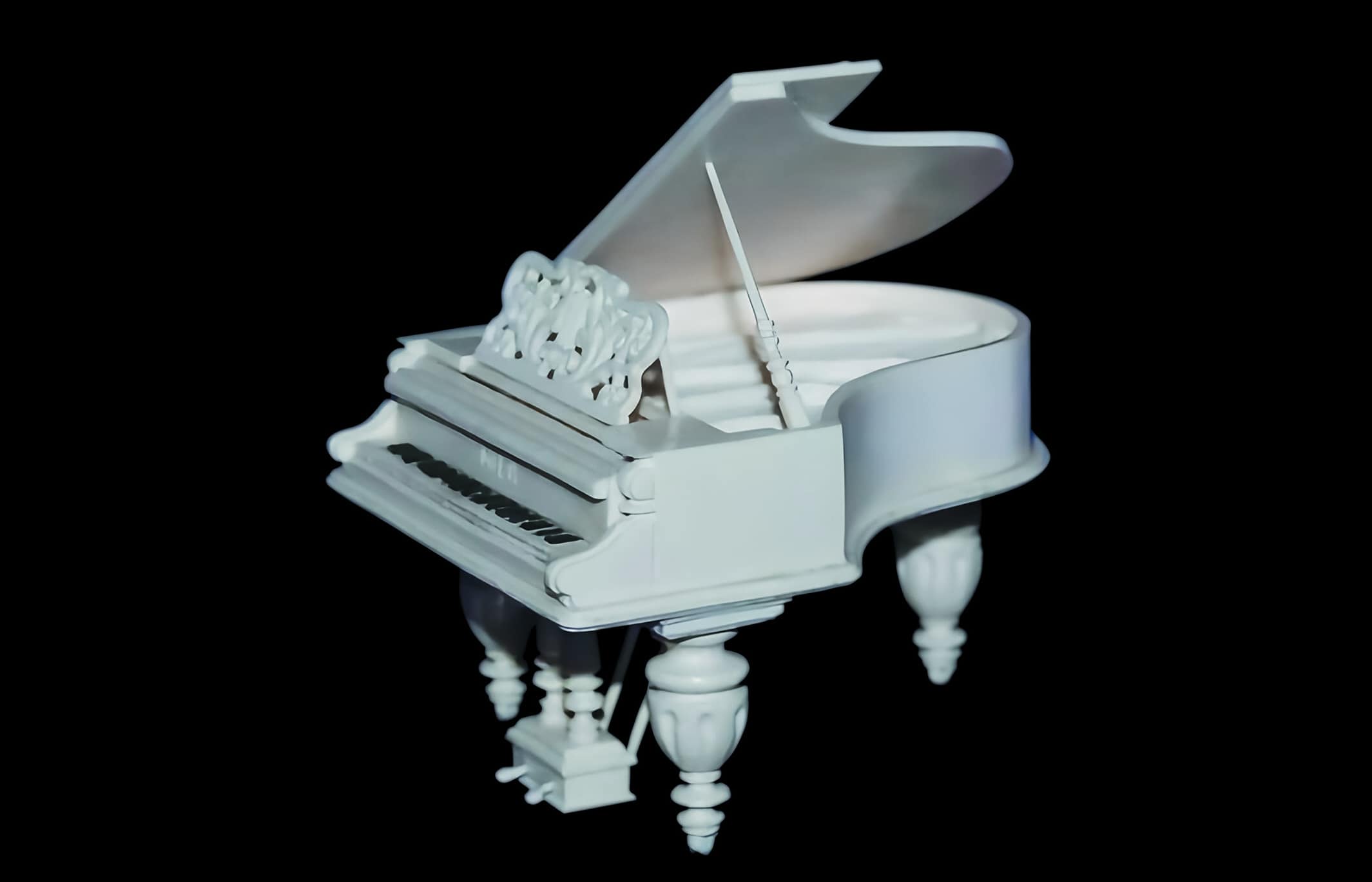 white crand piano miniature photo